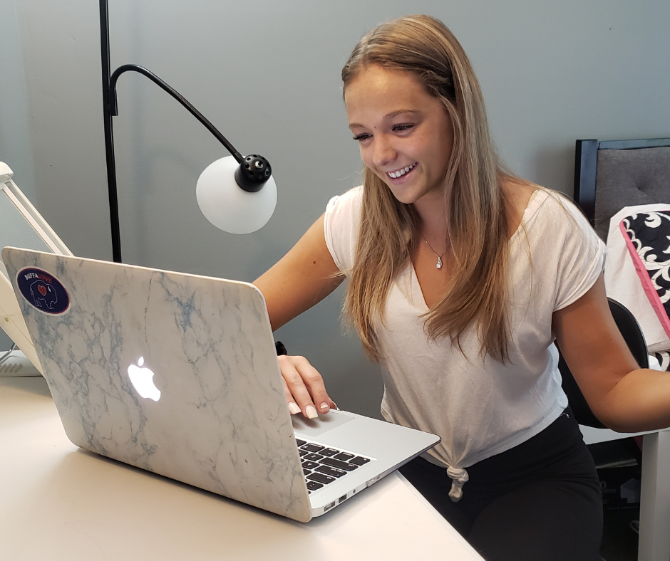 a girl enjoying her computer